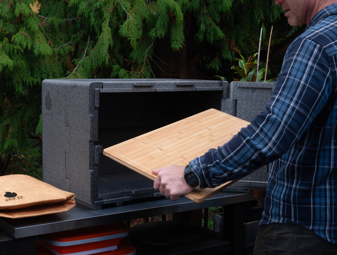 Cutting board being placed into que crib