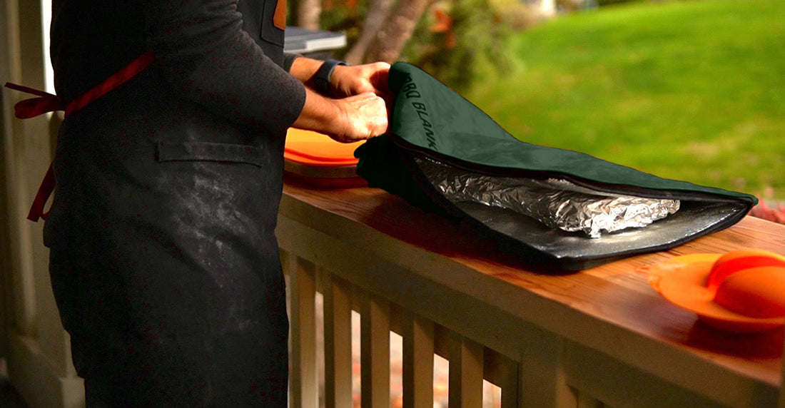 Person with green rest ez bbq blanket outside on deck