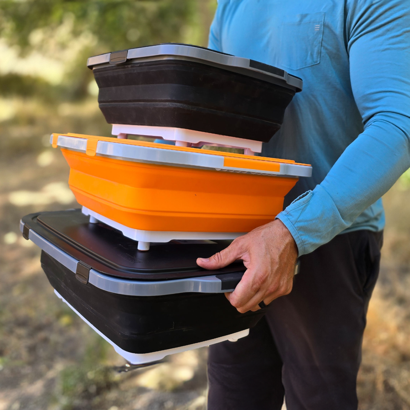 Man holding three piece Prep tubs