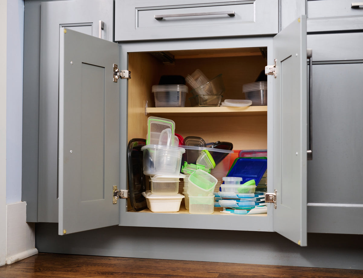 Before: food storage containers taking up cabinet space
