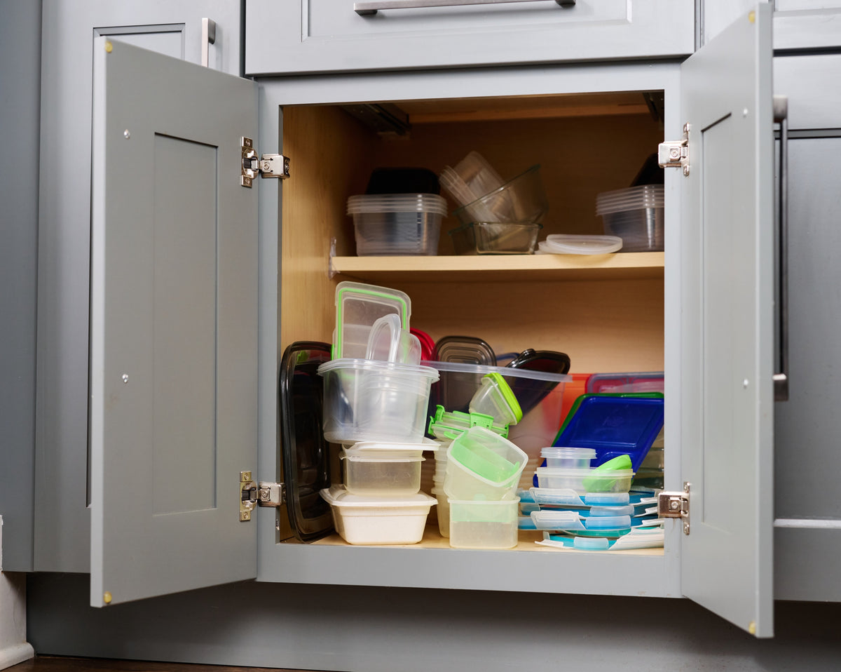 Messy kitchen cabinet before Secondz®